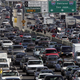 A photo of a large traffic jam on an American highway.